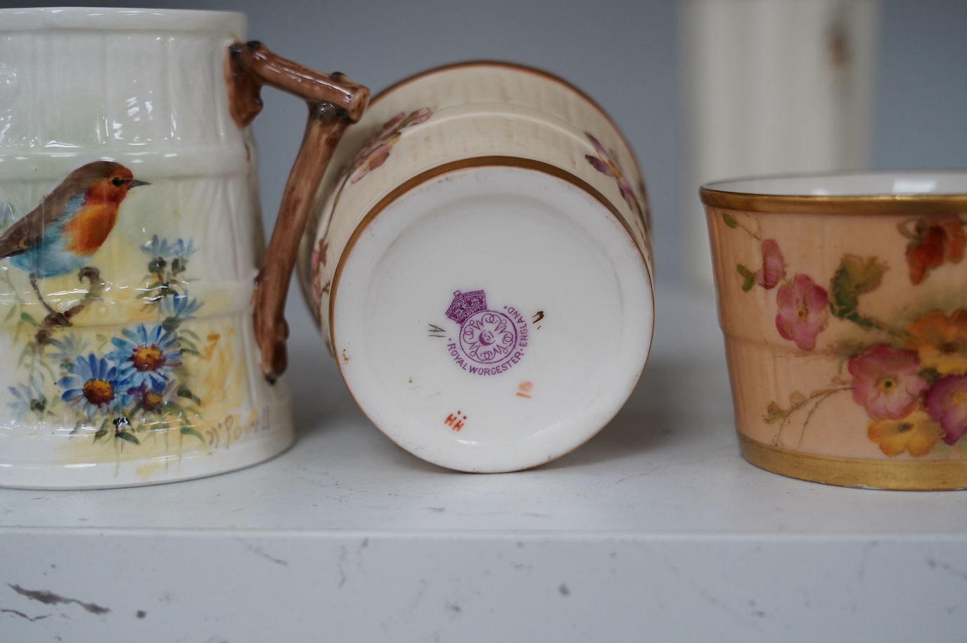 A group of Royal Worcester to include three jugs, two mugs, and two pots, etc. (8). Condition - some damage